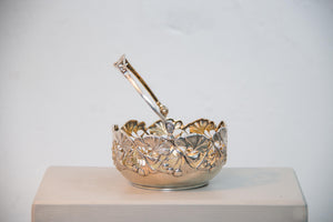 A small handled bowl with ginkgo pattern by A. F. Rasmussen
