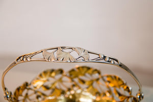 A small handled bowl with ginkgo pattern by A. F. Rasmussen