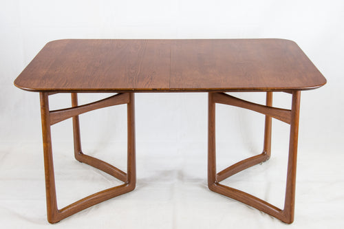 Extendable teak dining table by Peter Hvidt and Orla Mølgaard-Nielsen for France and Daverkoven