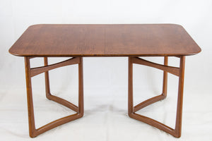 Extendable teak dining table by Peter Hvidt and Orla Mølgaard-Nielsen for France and Daverkoven