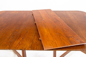 Extendable teak dining table by Peter Hvidt and Orla Mølgaard-Nielsen for France and Daverkoven